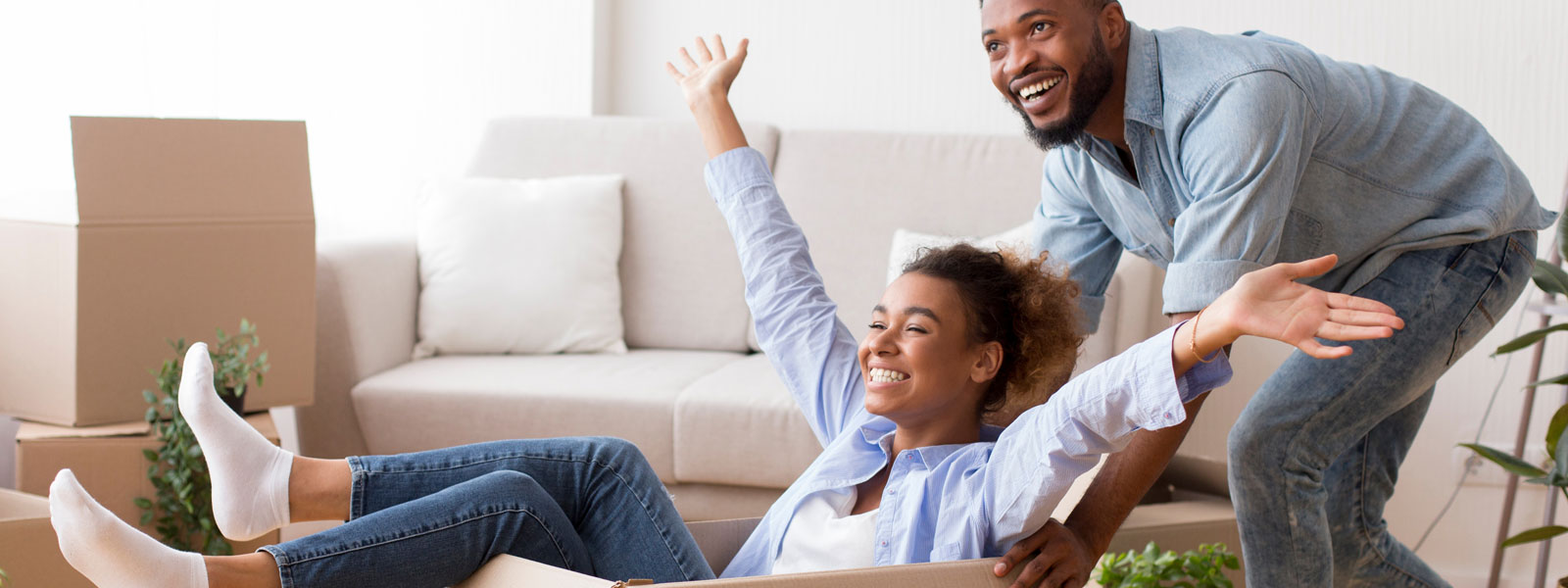 Afro Husband Riding Wife In Moving Box In New House